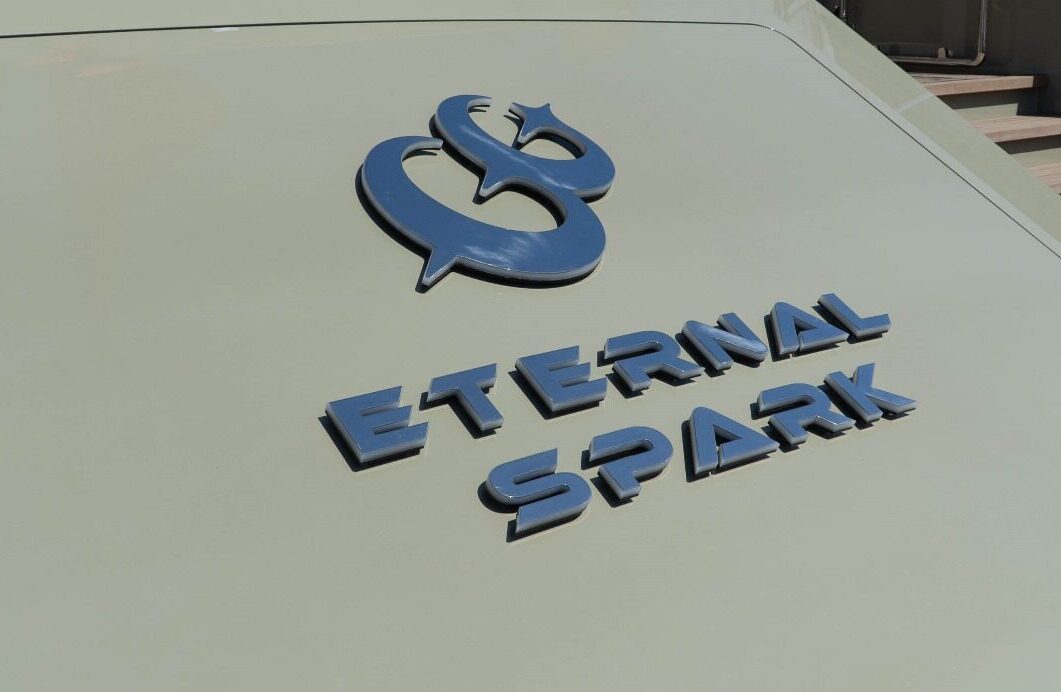 Eternal Spark yacht aft logo