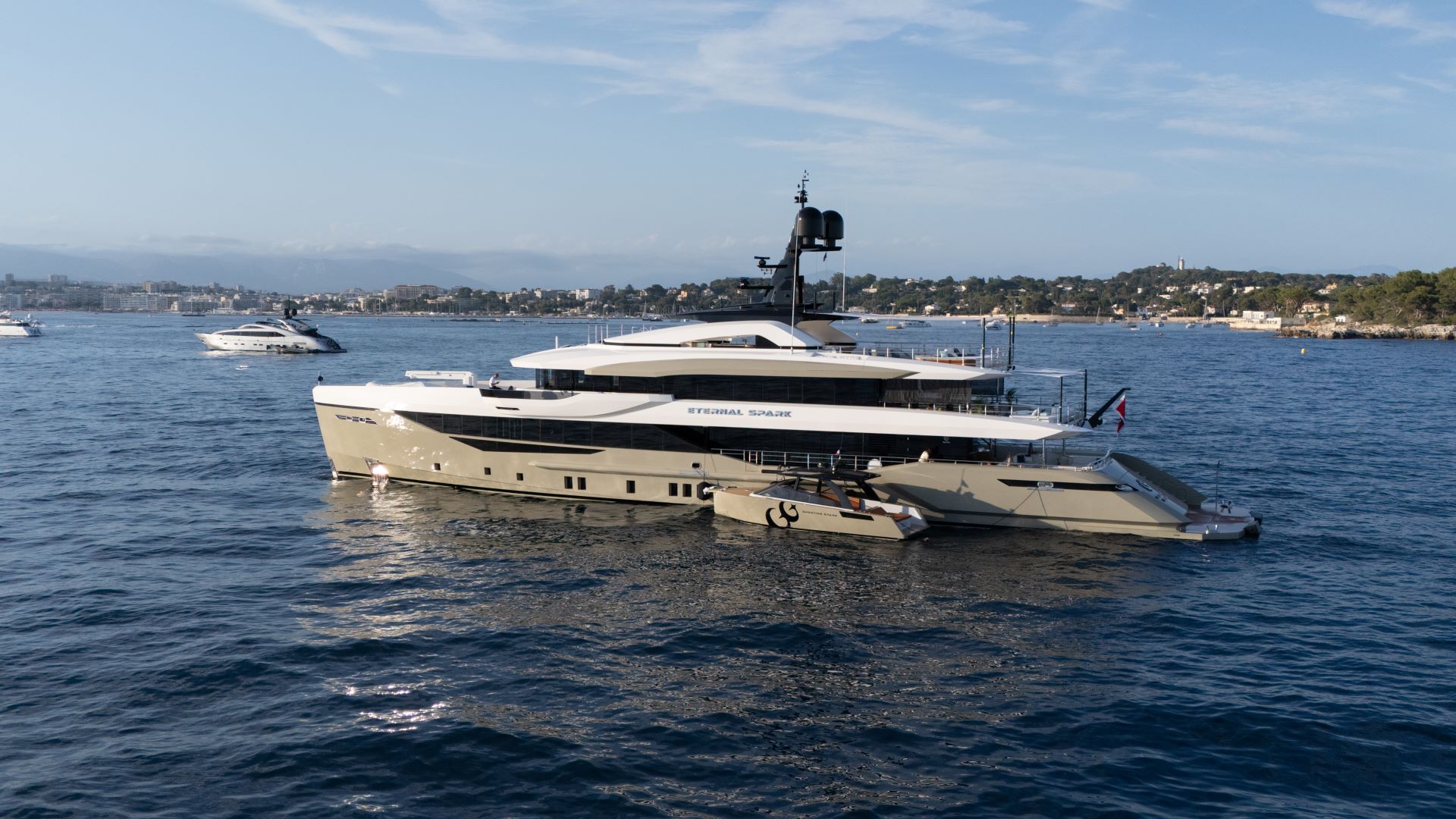 Eternal Spark portside view with chases boat