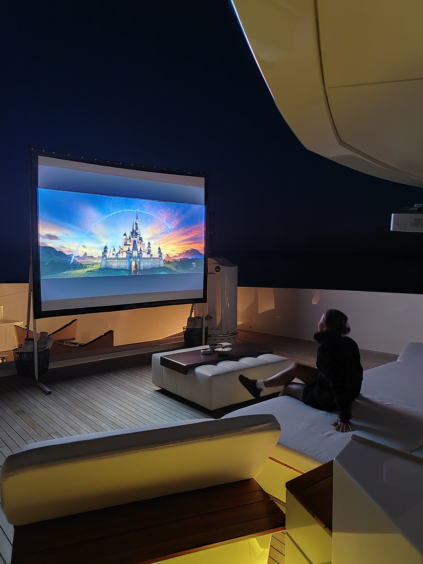 watching a movie outdoor cinema eternal spark yacht