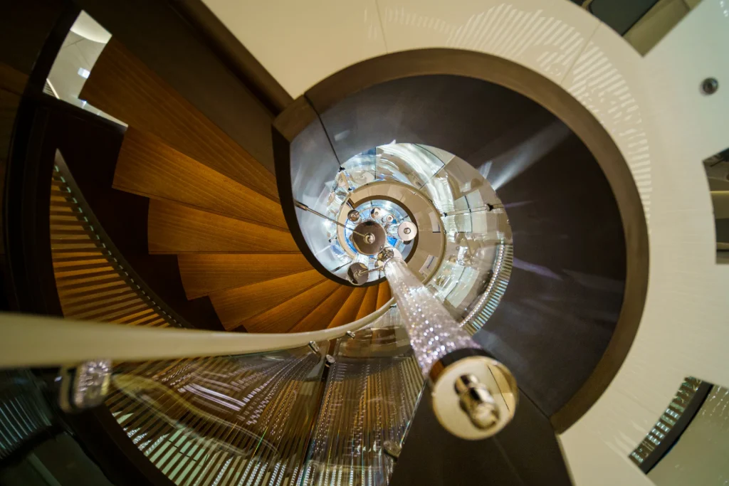 eternal spark yacht staircase looking up